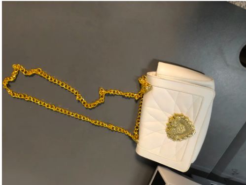 金链变腰带 旅客将799克黄金制成挎包链条入境被查——贵金属管制的沉重警示